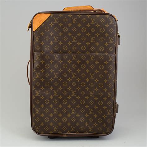 louis vuitton suitcase on wheels|louis vuitton suitcase carry on.